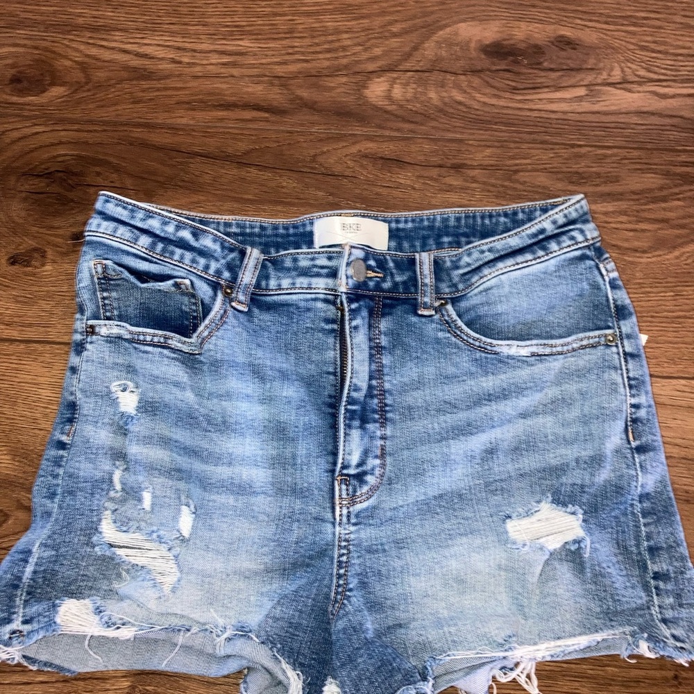 BKE denim women’s Light Blue Distressed Denim Shorts size 32